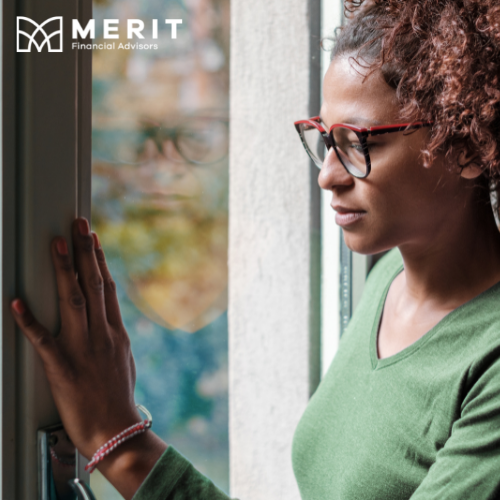 woman looking out of window