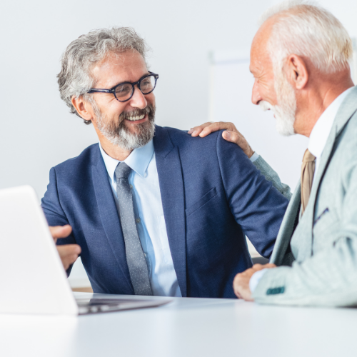older men laughing with each other older men laughing with each other