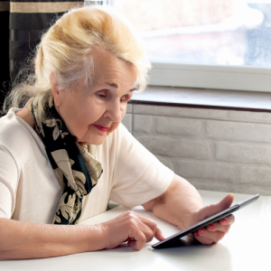 Blog Image (8) lady looking at tablet