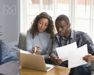 couple looking at taxes couple looking at taxes