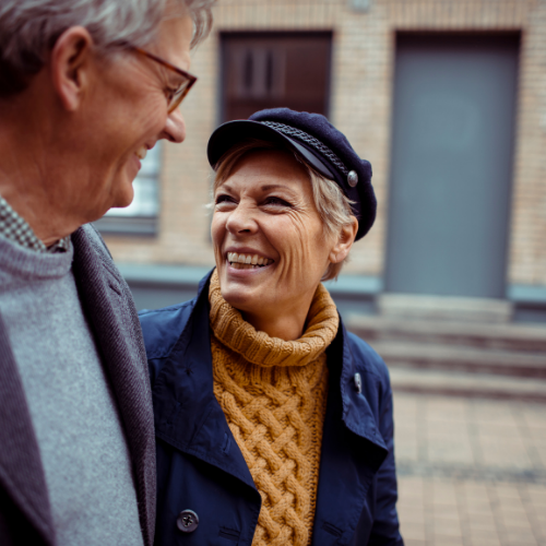 older couple laughing with each other