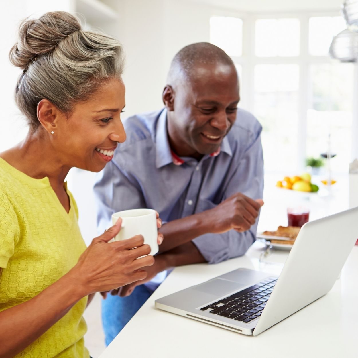 Mature couple and laptop