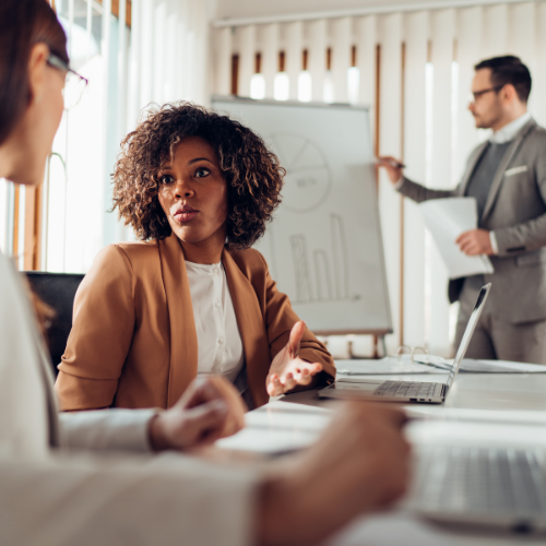 Women talking during a business meeting