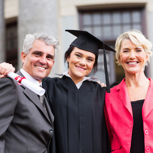 parents with daughter at graduation